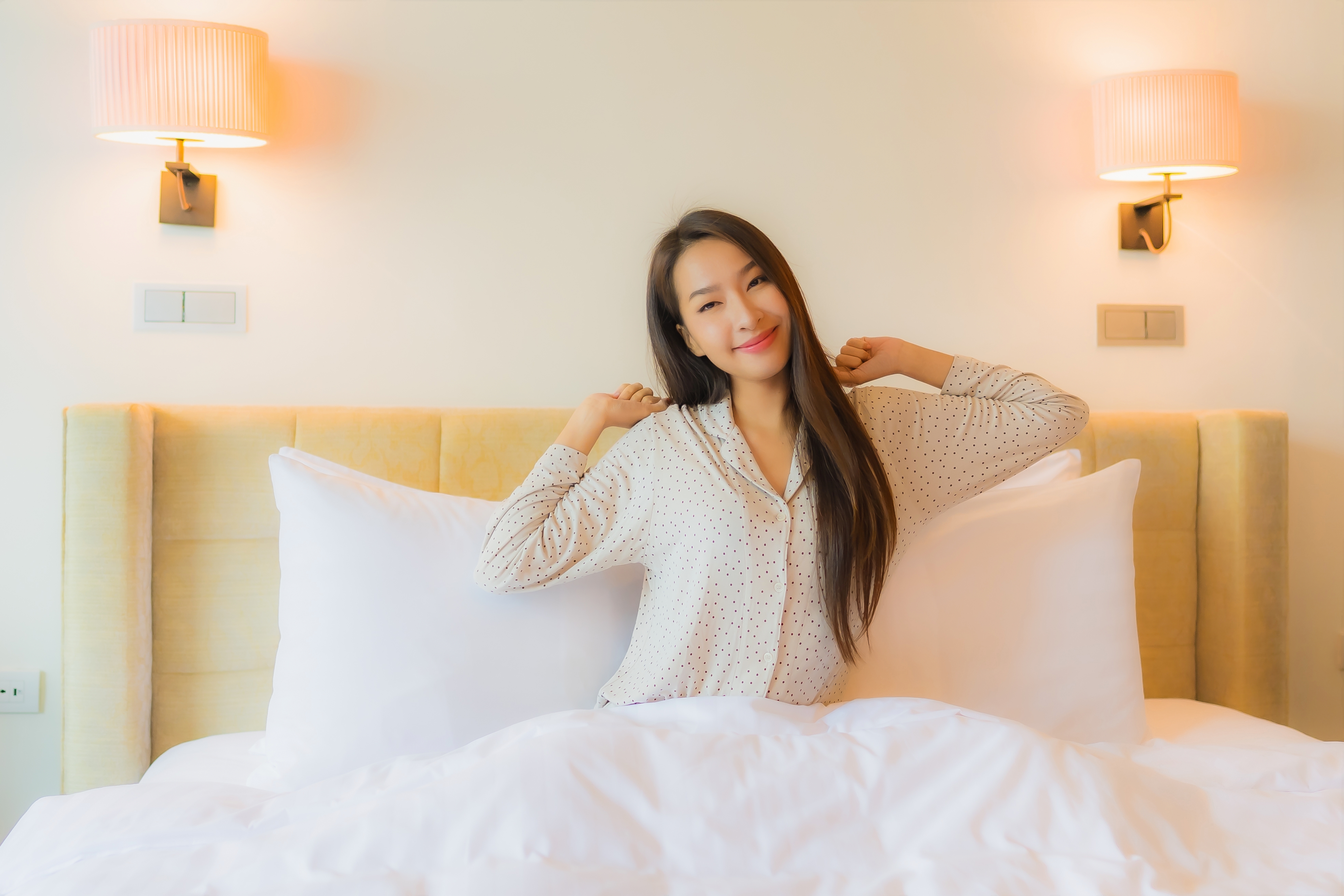 portrait-beautiful-young-asian-woman-smile-happy-relax-bed.jpg